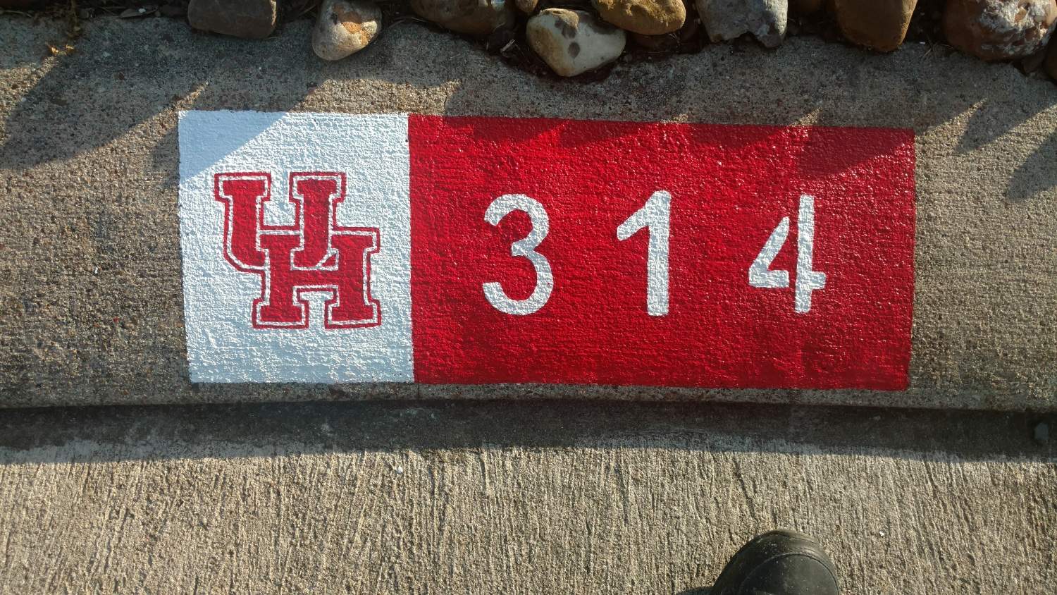 University of Houston themed curb painting in Houston Texas